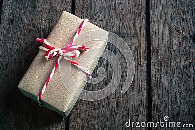 Gift box on wooden background