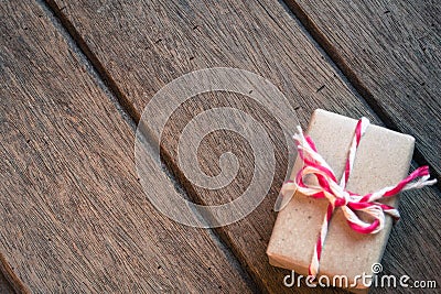 Gift box on wooden background