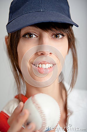 Girl with baseball ball