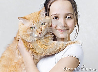 A girl with a big red cat
