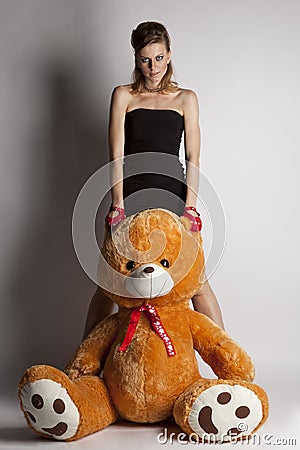 Girl with a big teddy bear