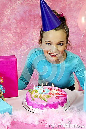 Girl Blowing Birthday Candles Out
