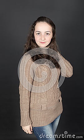 Girl in brown sweater