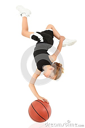 Girl Child Upsidedown Balancing on Basketball