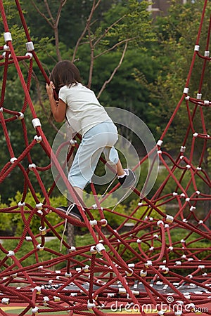 Girl Climbs Red Ropes