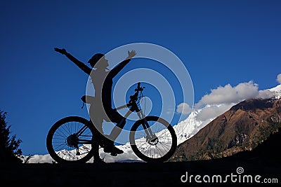 Girl cycling at the road