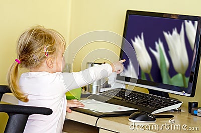 Girl at desktop computer