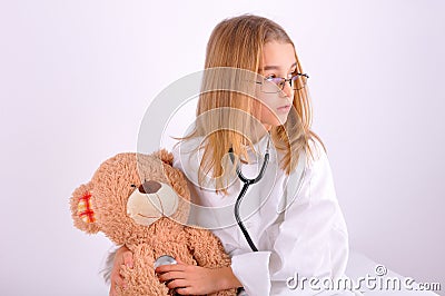 Girl doctor treated her teddy bear