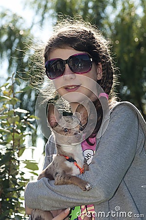 Girl with dog back light