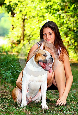 Girl with dog in a park