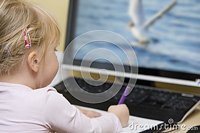 Girl draw from computer screen