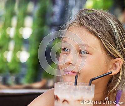 Girl is drinking a milkshake