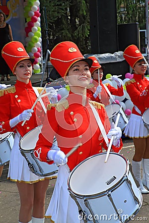 Girl with drum.