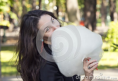 Girl eating cotton candy