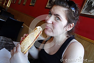 Girl eating a sandwich