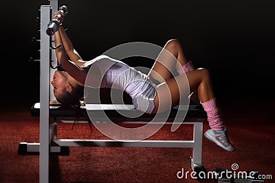 Girl in gym Bar Bench Press