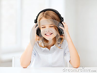 Girl with headphones listening to music