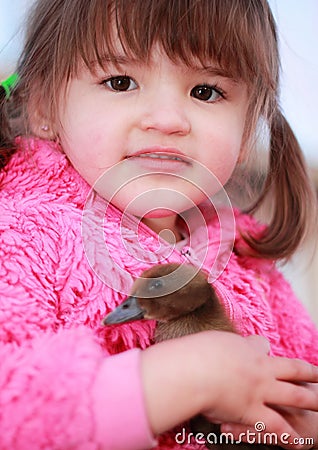 Girl Holding Baby Duck