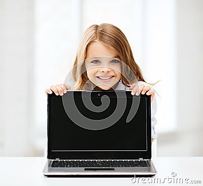 Girl with laptop pc at school