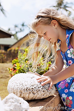 Girl and large stone sea