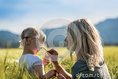Girl and Mommy in a wheat field