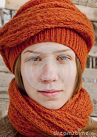 Girl in orange knitted scarf