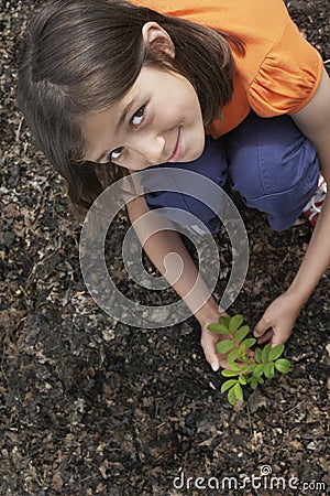 Girl Planting Black Locust Tree