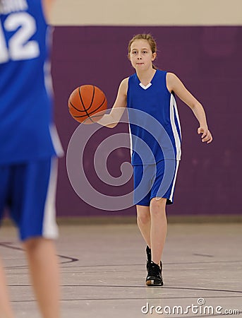 Girl playing basketball