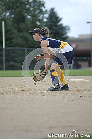 Girl Playing Second Base on Softball Field