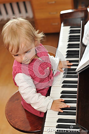 Girl plays piano