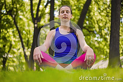Girl practicing yoga and meditation
