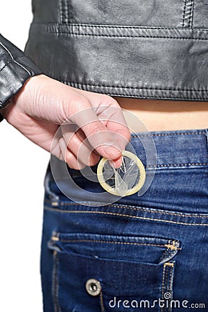 Girl pulling out condoms from her jean pocket