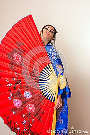 Girl with red asian fan