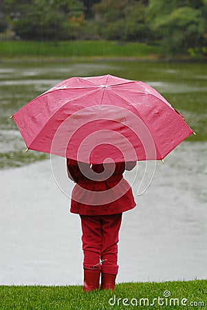 Girl in red under the rain