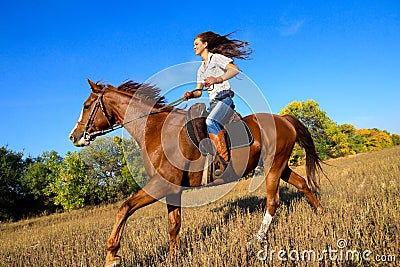 Girl riding a horse