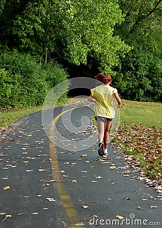 Girl running on trail