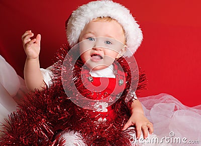 Girl santa on red cloth