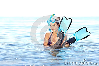 Girl with snorkel equipment