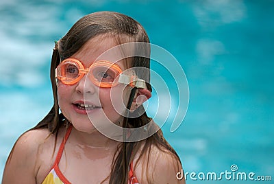 Girl swimming with goggles