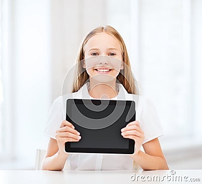 Girl with tablet pc at school