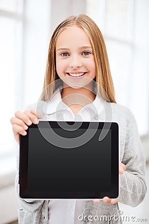 Girl with tablet pc at school