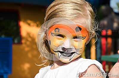 Girl with tiger face painting