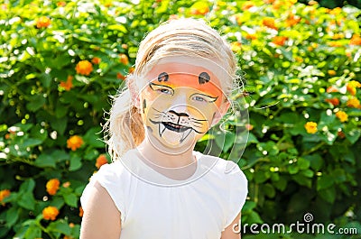 Girl with tiger face painting