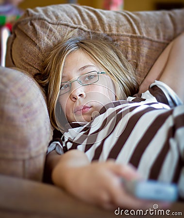 Girl with tv remote control