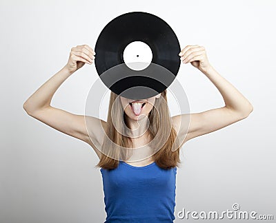 Girl with vinyl disc, on white
