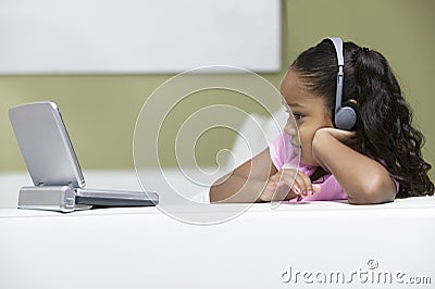 Girl Watching Movie On Portable DVD Player