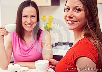 Girls drinking coffee and talking