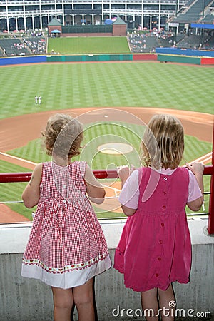 Girls Watching Baseball Game