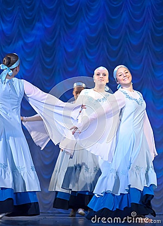 Girls in white dresses dancing on stage, Russian National Dance