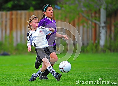 Girls Youth soccer kick